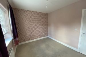 Feature wall with Laura Ashley Wallpaper, Flemings Contractors